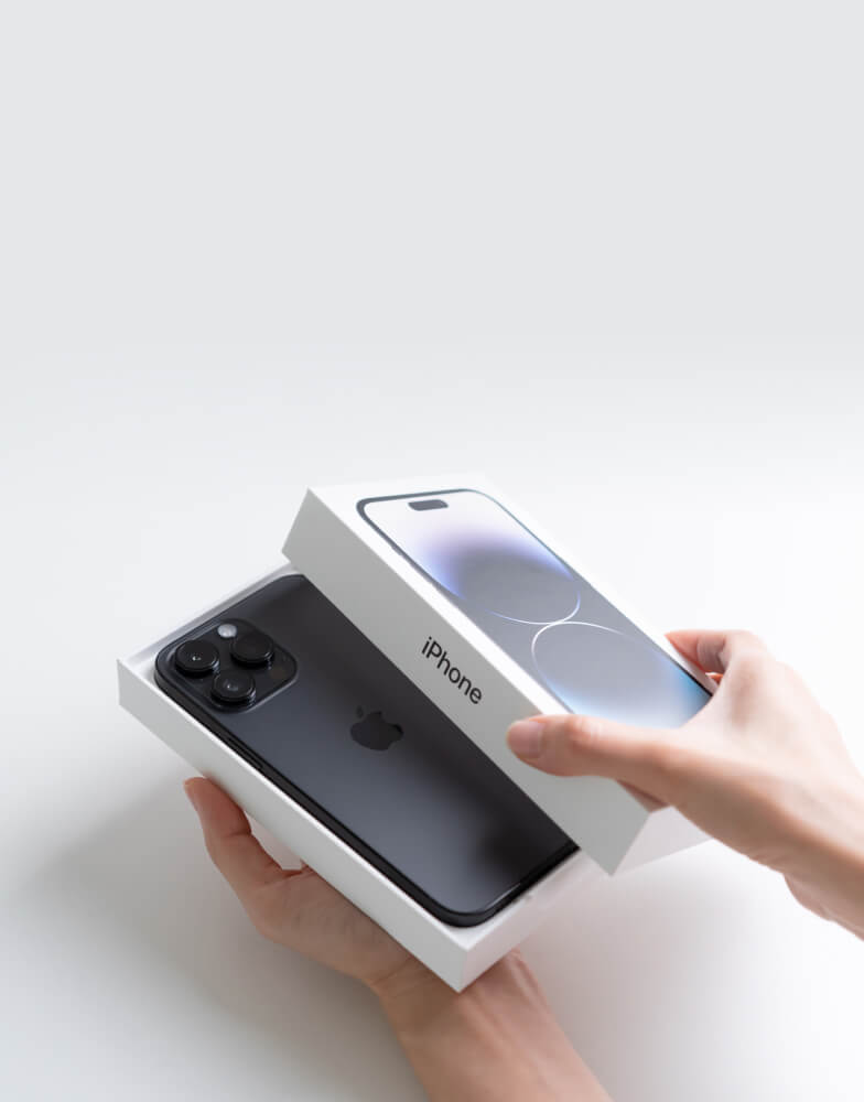 Person unboxing iPhone