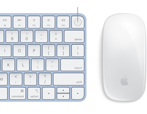 Close-up of colour-matching Magic Keyboard and Magic Mouse, with Touch ID fingerprint in focus