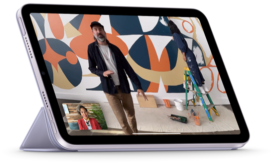 iPad mini shown in landscape view attached to Smart Folio in a viewing position. The display is showing a FaceTime call with Centre Stage
